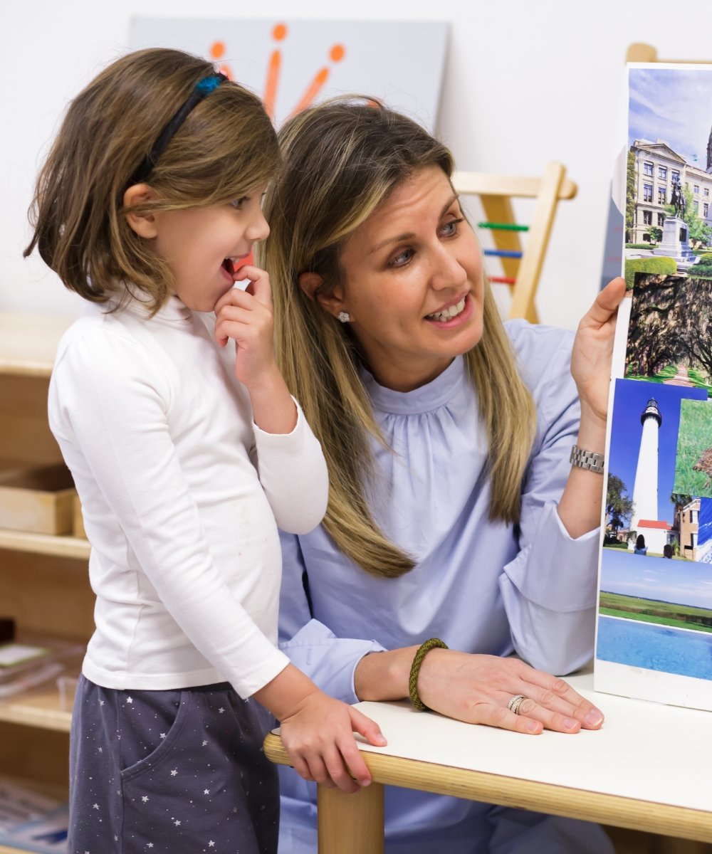 parent and student looking at posters together