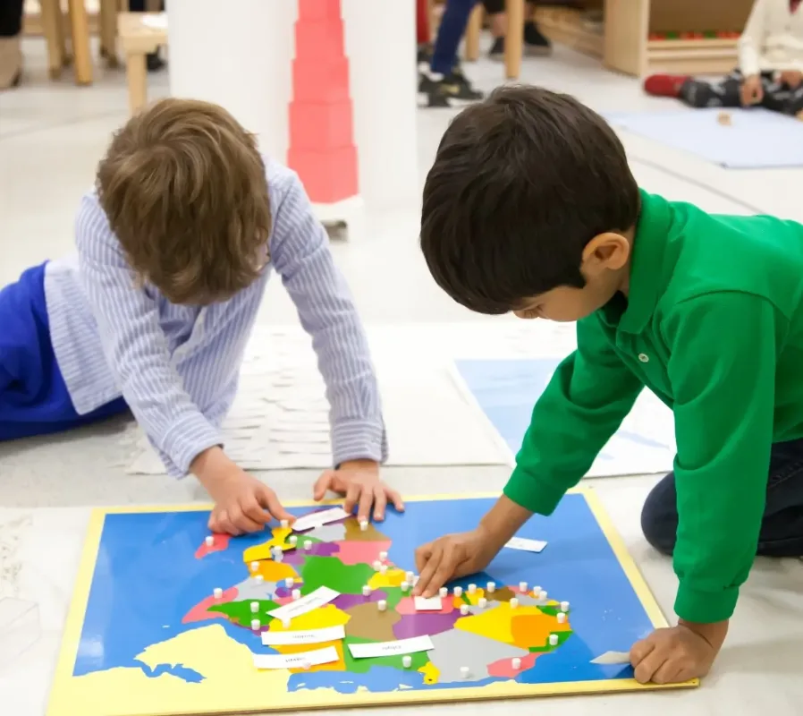 two children using a map