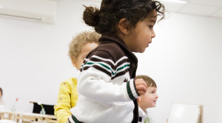 toddler students jumping